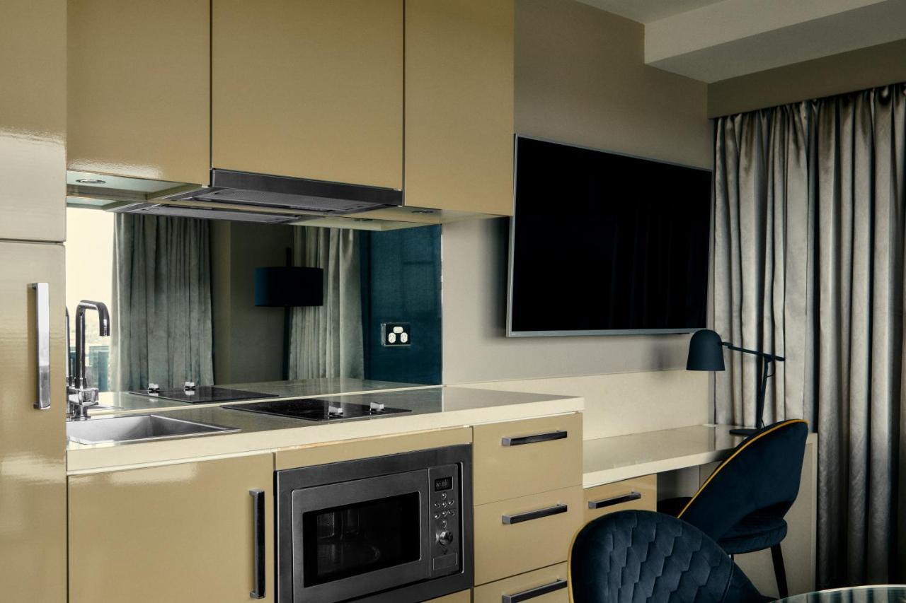 Hotel The Kinson Melbourne Esterno foto A kitchen in a serviced apartment